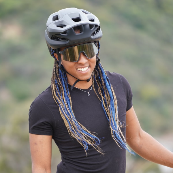 Dani Johnson with helmet and sunglasses